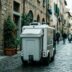 DustCart autonomous waste collection robot navigating an Italian alley