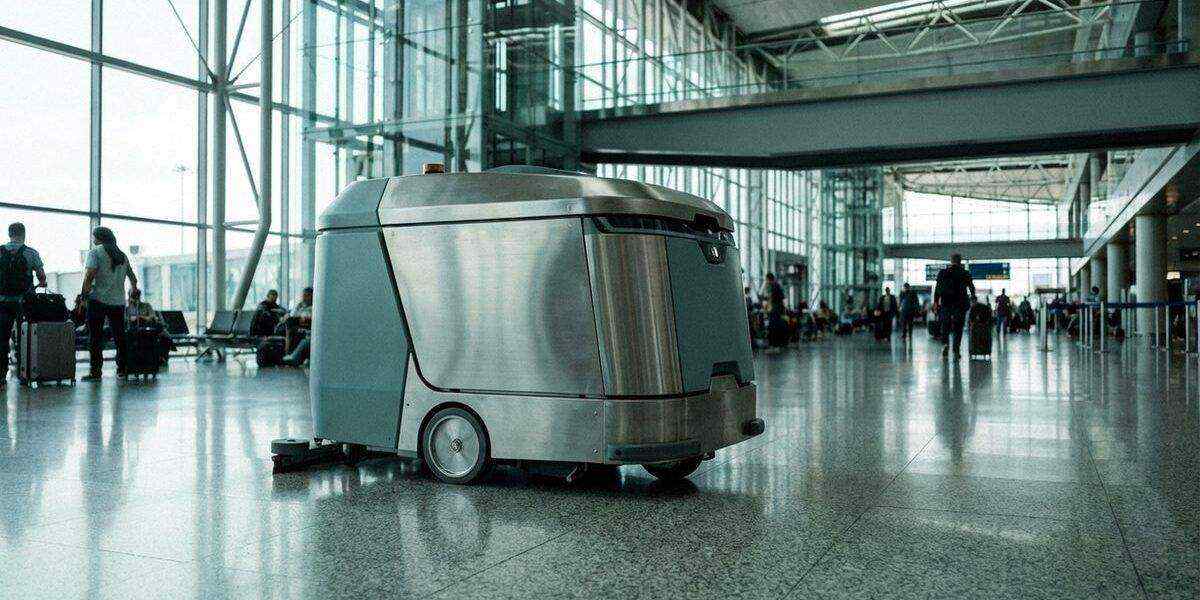 Gaussian Robotics autonomous floor cleaning robot in an airport terminal